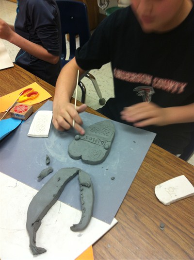 Students working on pottery